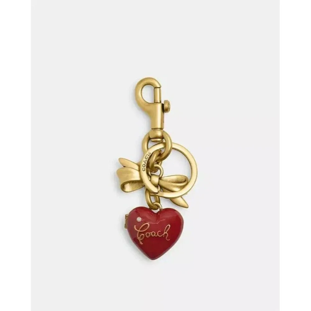 Coach CZ276 Bow Heart Locket Bag Charm-Brass/Ruby